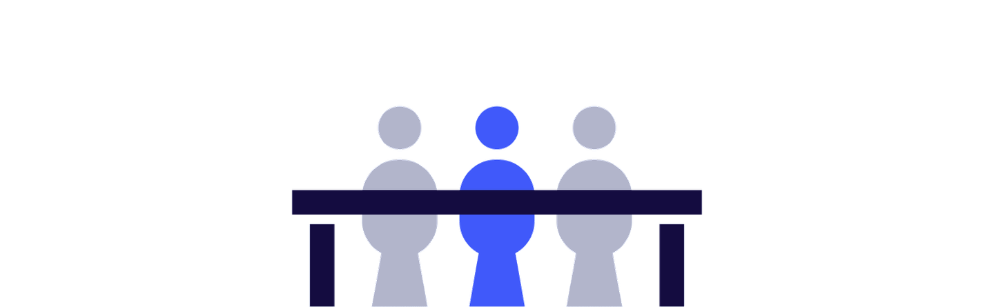 An icon representing 3 people sitting on a long desk.