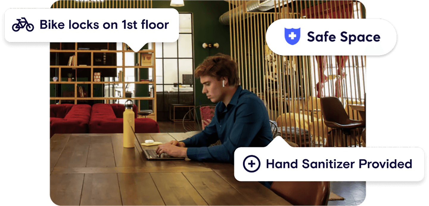 A person at a desk, looking at option for renting a workspace on the Deskpass app.